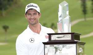 Adam Scott with the winners trophy after the final round of the PGA Grand Slam of Golf in Bermuda.